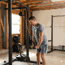 4 body-solid-bsthp-high-pulley-attachment-in-use-garage-gym-tricep-pushdown.png